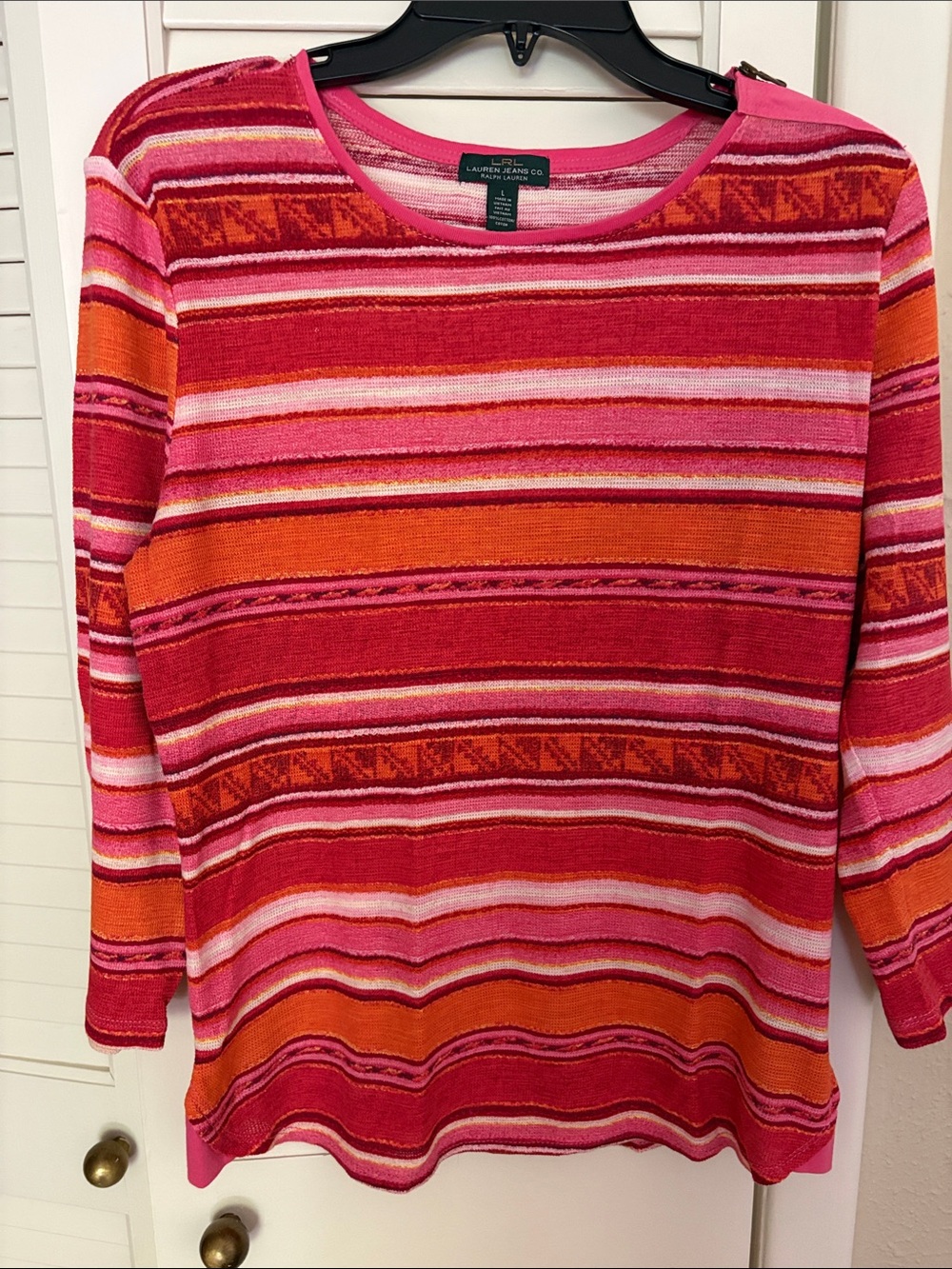 Long sleeve springy top with shoulder zip.  Casual & cool for spring/summer